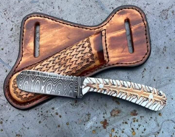 Damascus steel fixed blade bull cutter knife with pancake leather sheath and white pine cone scale handle image 0