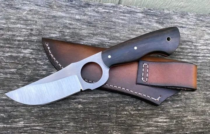 Cowboy hunter knife with rose wood handle and finger hole grip image 0