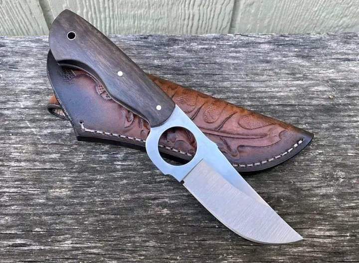 Cowboy hunter knife with rose wood handle and finger hole grip image 0