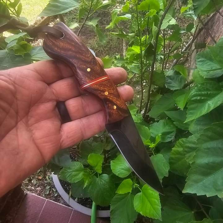 8 inch black coated cowboy knife with black rose wood handle and leather sheath image 0