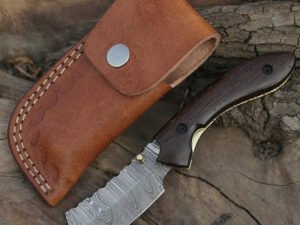 Best cowboy pocket knife with Damascus steel and bull cutter blade.