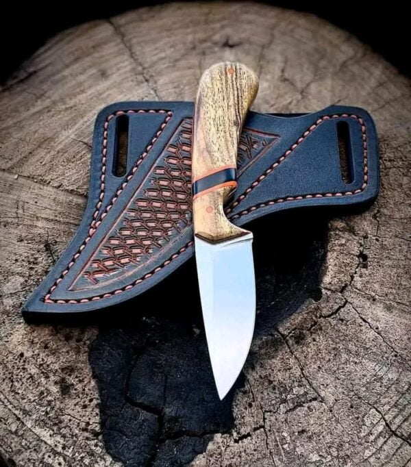custom cowboy knife with D2 steel blade, olive wood handle, and brown leather sheath