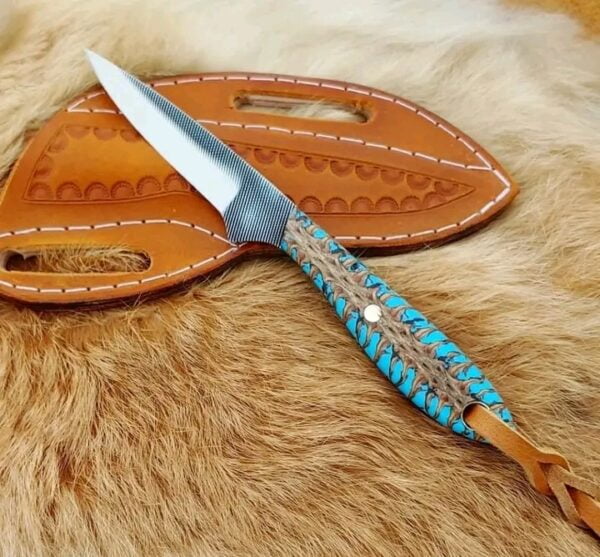 Cowboy rasp knife with forged farrier rasp steel blade, pine cone handle and cowhide leather sheath. Overall length 8 inches.
