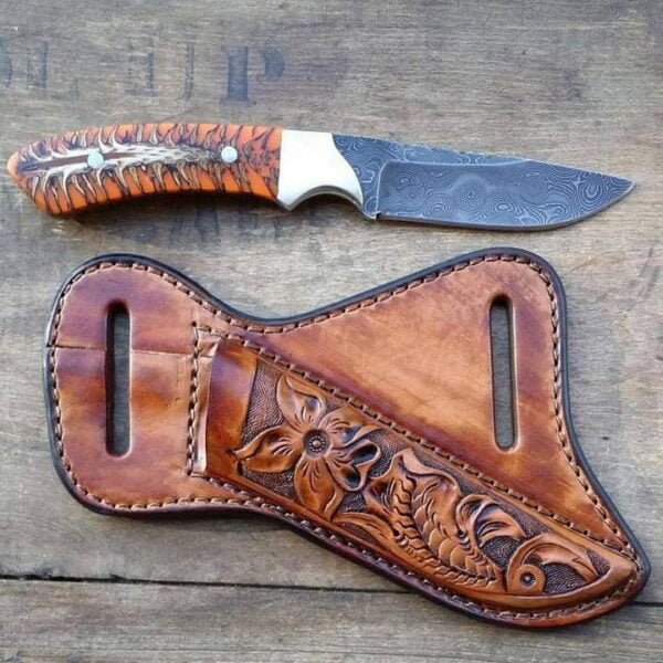 Damascus steel cowboy knife - orange pine cone handle and tooled leather sheath