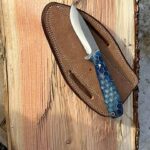 D2 handmade cowboy skinning knife with blue honey comb handle and scout carry leather sheath