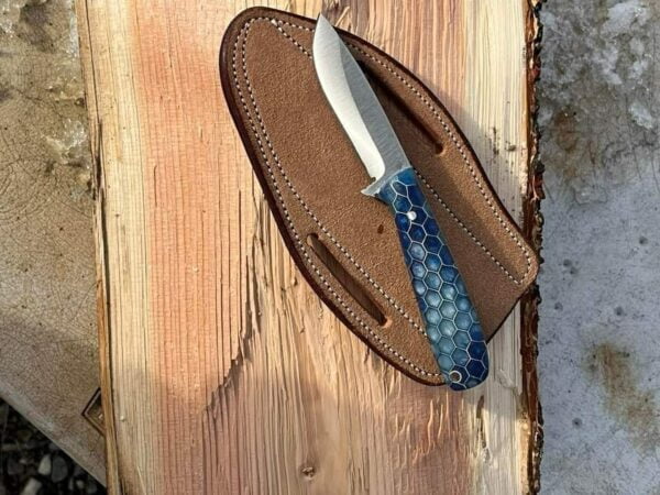 D2 handmade cowboy skinning knife with blue honey comb handle and scout carry leather sheath