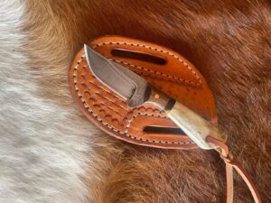 Western Cowboy Knife with stag antler handle and cross draw leather sheath