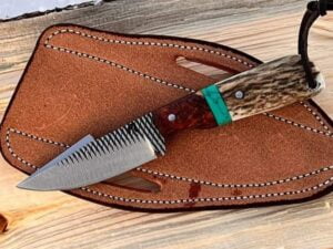 Cowboy Knife with stag antler handle, full tang rasp steel blade and leather sheath