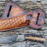 Handmade Damascus Steel Fixed Blade Cross Draw Cowboy Knife with Rain Drop Pattern, Pine Cone Handle, and Pancake Leather Sheath