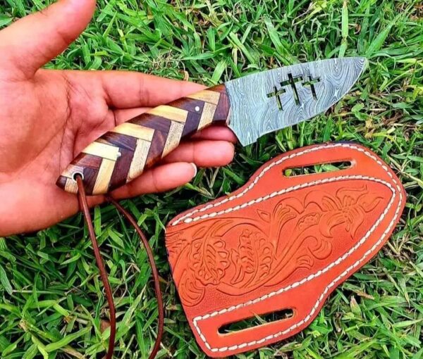 Damascus steel Cowboy knife with combined olive wood and rose wood handle.