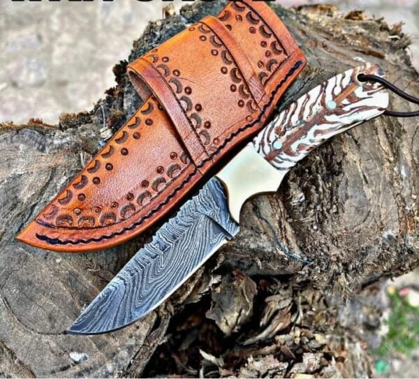 Handmade Damascus Cowboy Knife with Twist Pattern Blade, Pine Cone Handle, and Leather Sheath.