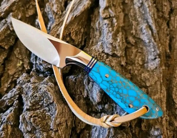 Handmade Cowboy Belt Knife with Turquoise Handle and Leather Sheath.