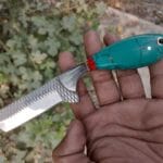 Traditional cowboy bull cutter knife with farrier rasp blade, Turquoise opaque handle and pancake leather sheath.