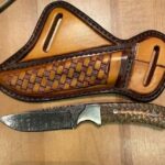 Fixed blade Cowboy hunting knife with pancake leather sheath and pine cone handle. For sale