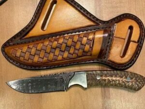 Fixed blade Cowboy hunting knife with pancake leather sheath and pine cone handle. For sale