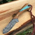 Damascus Cowboy hunting knife olive wood handle with pancake Sheath.