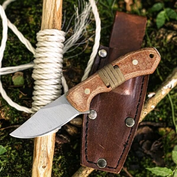 Rasp steel cowboy knife with leather sheath micarta handle.