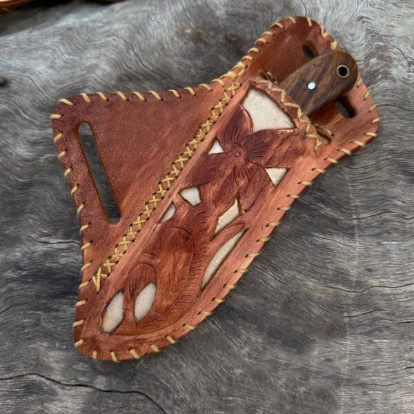 Handmade Pancake Sheath - The genuine cowhide leather sheath designed for the Damascus Cowboy Knife, featuring a lanyard hole for easy attachment and storage.